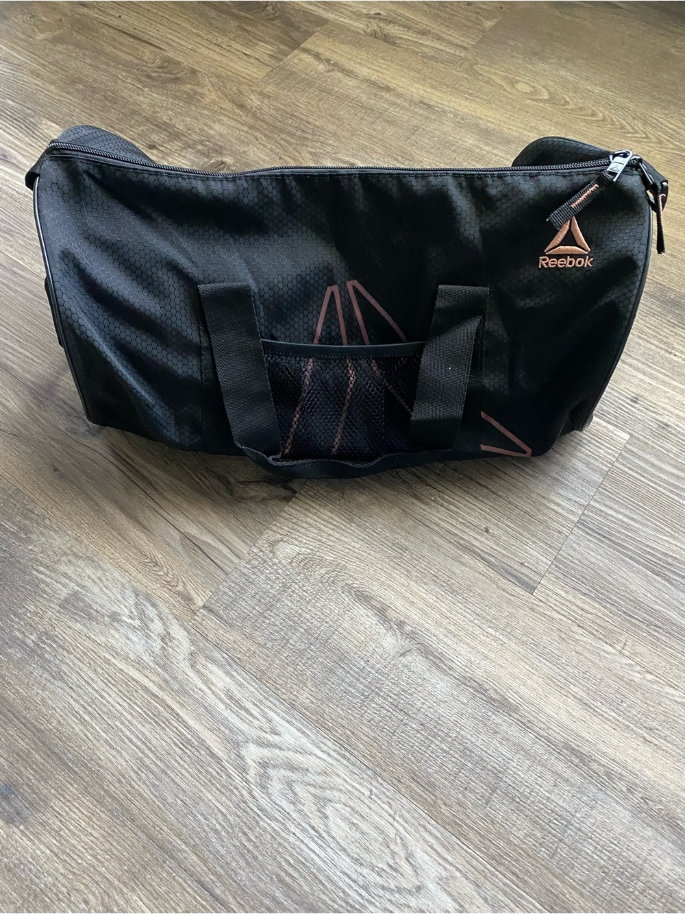 Reebok Women’s Black Duffel Bag with Subtle Rose Accents